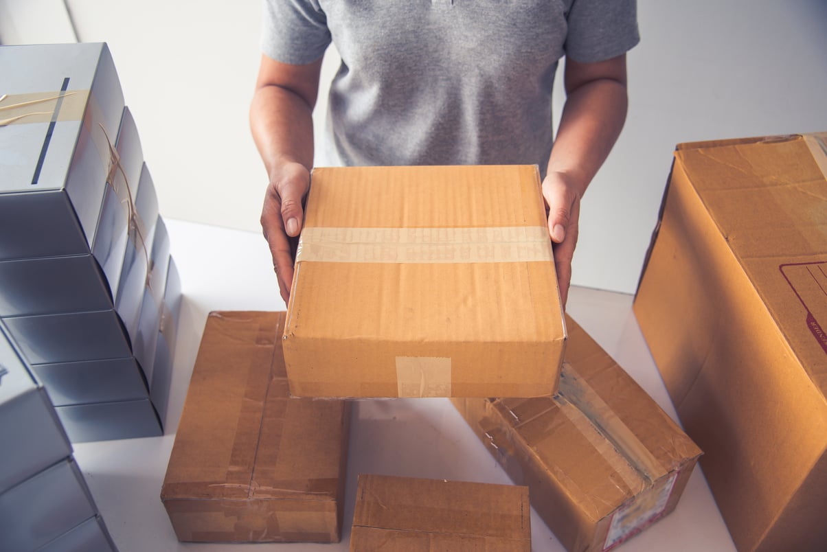 Courier Arranging Parcels for Shipment